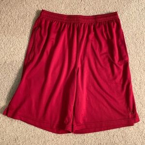 Red men’s mesh athletic shorts